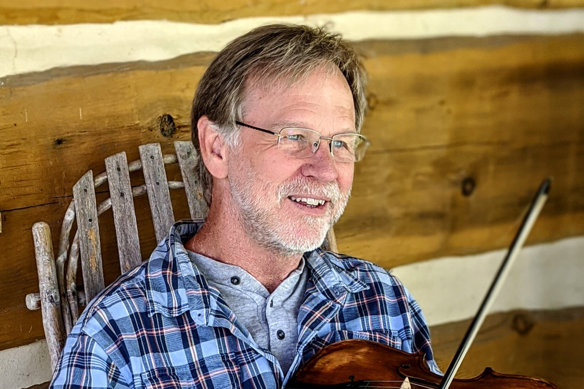 Dale-Farmer-portrait-on-porch.jpg